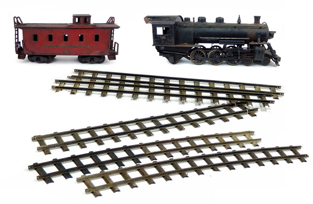 Buddy ‘L’ Outdoor Railroad ride-on locomotive, caboose and track. Stephenson’s Auctioneers image